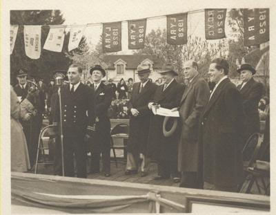 Lt. A.C. Jones R.C.N.R. Commanding Officer of HMCS OAKVILLE speaks at Christening Ceremony