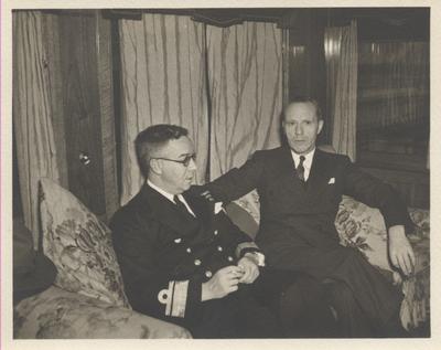 Rear Admiral P. W. Nelles RCN Chief of Naval Staff and the Hon. Angus Macdonald, Minister of National Defence for Naval Affairs, at the Oakville Club