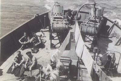 Crew members on HMCS Oakville laundry day