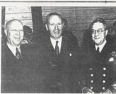 Oakville's Mayor Deans, Defence Minister Angus MacDonald, and Admiral Percy Nelles at the HMCS Oakville's Christening Ceremony