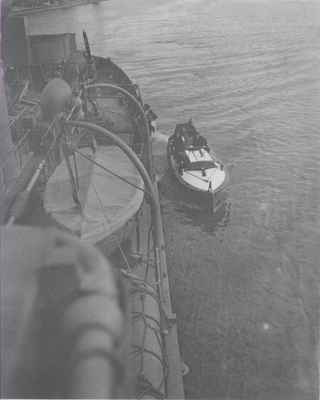 Admiral Nelles Approaches HMCS Oakville in Launch