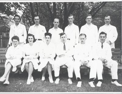 Dr. Juliet Chisholm (located in the 1st row, third person from the left) and fellow staff members at the Children's Hospital (Toronto)