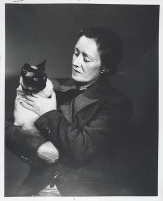 Hazel Chisholm Mathews with one of her many Siamese cats