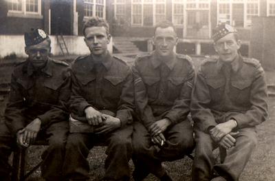 Gary Kress, Chuck Hamilton, Sid Brown, and William Holbrook (left to right). At Stanley Barracks, Toronto, before going overseas with the Lorne Scots 2nd Division of the Royal Canadian Army, 1941.