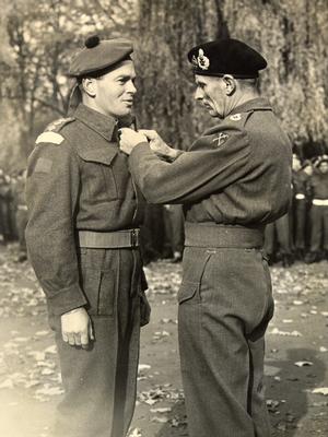 John MacMorran (Jock) Anderson receiving his first Military Cross - invested by Field Marshall Montgomery in Ghent, Belgium, October 1944.