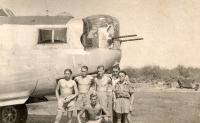 Flight Lieutenant John Caird (front centre)in Burma with part of the crew of a B24 Liberator Bomber in early 1945