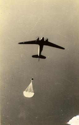 Plane parachuting supplies during training of the First Special Service Force in Helena, Montana, c. 1942-1943