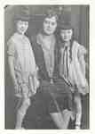 Unidentified woman with 2 young girls