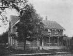 A photograph of the old parsonage at the north east corner of Church and Centre St.
