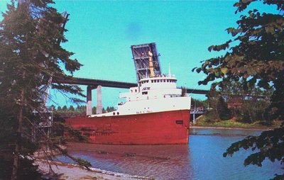 A Freighter Passing Underneath the Garden City Skyway on the Welland Ship Canal