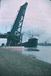 A Ship Passing Underneath the Homer Lift Bridge