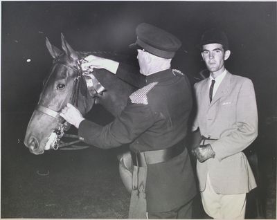 Horse receiving ribbon at Kiwanis Horse Show, St. Catharines