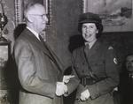 C. Bruce Hill presenting a chevron to Lt. O. W. Ross, St. Catharines