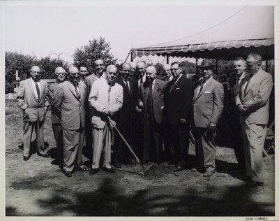 Group photograph of city leaders and officials at an official ceremony