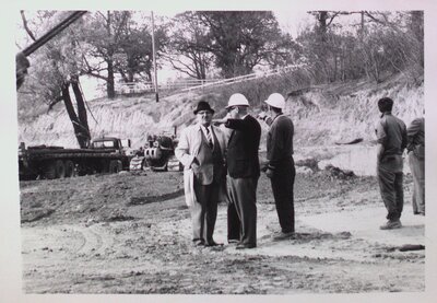 Ivan Buchanan, city employees and officials at a construction site