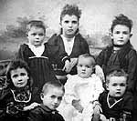 Studio photograph of Mabel, Sarah, James, Maria, Georgina, Bella, Charlotte and Violet Van Exan, Smiths Falls