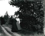 Two women posing by a tree by George Little, Smiths Falls, ca. 1905
