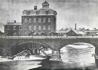 West Mill and Beckwith Street bridge, ca. 1900, A history of the Smiths Falls Lock Stations, 1827-1978 by Peter DeLottinville, Vol. II