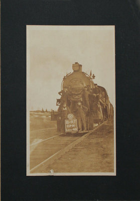 Photograph of Men on Train