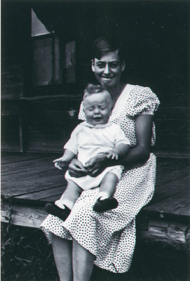Alma with unknown baby on verandah