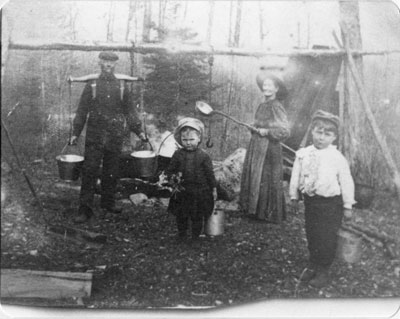 William Snow and Family Making Maple Syrup