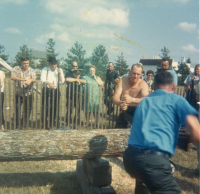 Two Men Sawing a Log, South River Agricultural Society Fall Fair, circa 1970