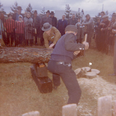 Two Elderly Men Sawing a Log, South River Agricultural Society Fall Fair, circa 1970
