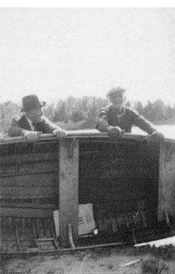 Martin and William Carroll Closing the Cottage for Winter, 1935