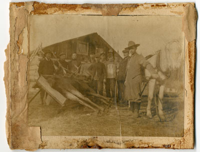 Hunters Standing Beside Their Bull Moose Kill, circa 1910
