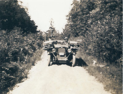 Hauling Lumber to South River in a Car