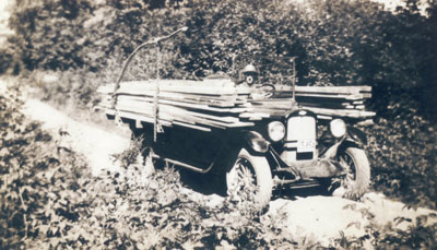 Ira Dahms Delivering a Load of Lumber