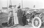 Ladies in front of Wrecked Car, circa 1910