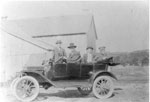 Family in car on Cottrell Farm, circa 1915