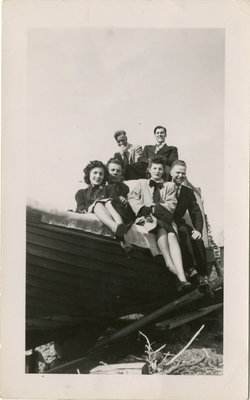 People Sitting on a Boat