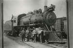 Steam engine and 4 men