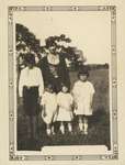 Woman and Four Children Outdoors