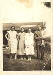Picture of Six Nations People in front of a Cookhouse