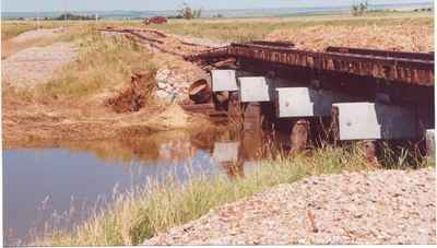 Railway bridge East of Vanguard after the flood