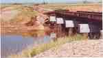 Railway bridge East of Vanguard after the flood