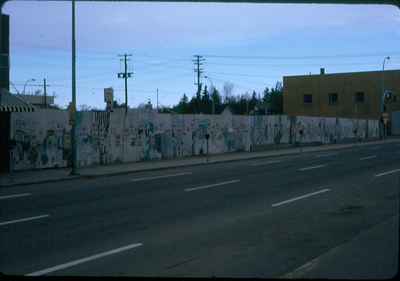 Fence Around Former Woolworth's Building Central and Chaplin