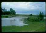 Storm Damage - High Water in Creek Riverside Dam