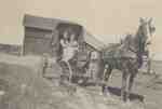 Mary and Dorothy Featherstone in a Carriage.