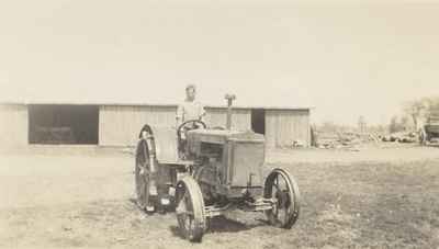 George Wettlaufer With Tractor, 1930's