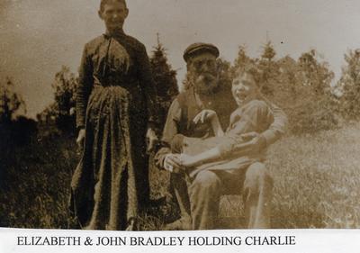 Elizabeth and John Bradley Holding Charlie