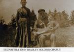 Elizabeth and John Bradley Holding Charlie