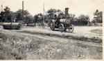 Road Grader Being Pulled By A Steam Tractor, 1913.