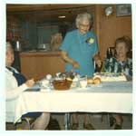 Cake Cutting at Mrs. Dave McDougall's 74th Birthday Celebration, circa 1970