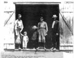 Family outside of Blacksmith Shop, Thessalon, 1918