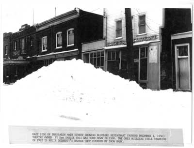 Bluebird Restaurant, Empire Theatre, and Delhenty`s Barber Shop, Thessalon, circa 1940
