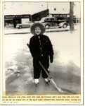 Young Girl Outside of Thessalon Dime Store, Winter, circa 1940